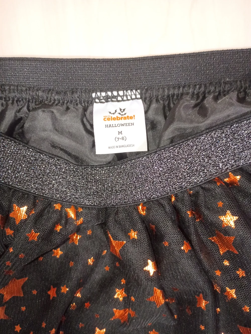 Spirit Halloween Black Tulle Skirt with Metallic Orange Stars -